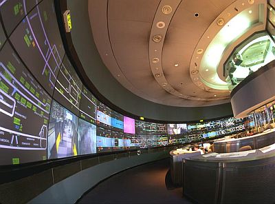 MBTA Control Center, a round room with 40+ screens on the wall